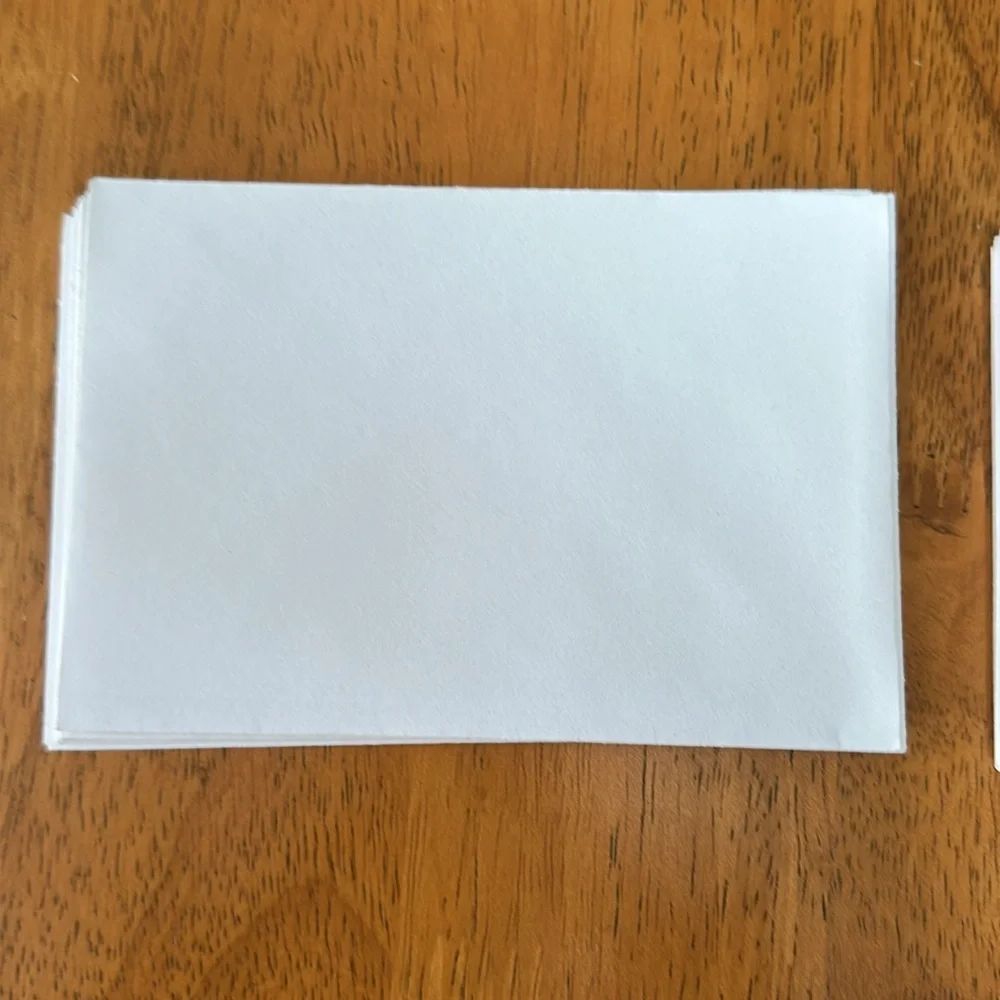 Sympathy thank you cards with matching envelopes. White with black writing